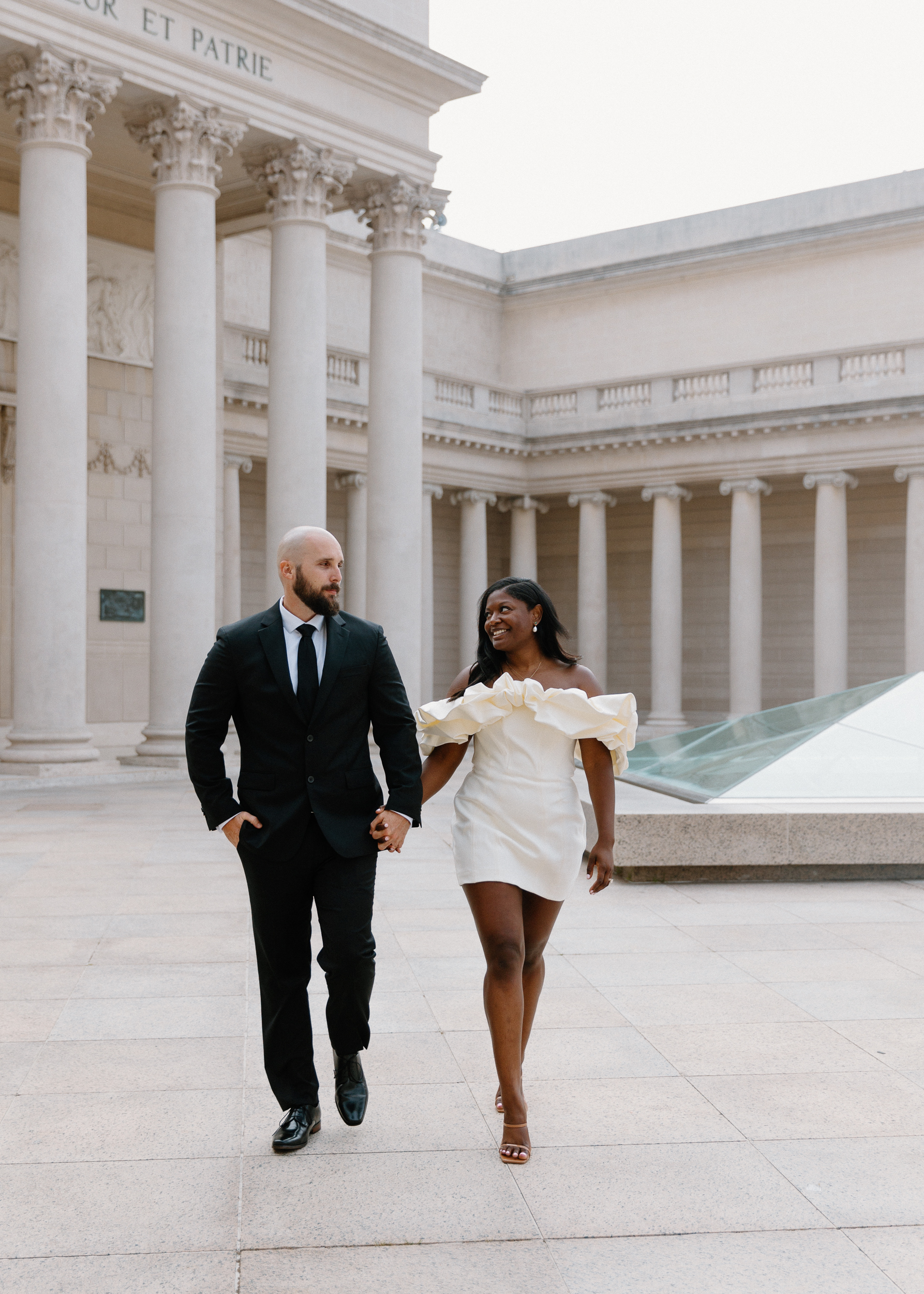 Neoclassical romance: The fog adds an air of mystery to the Legion of Honor's grand facade, providing a dreamlike backdrop for the couple's quiet exchange of vows.